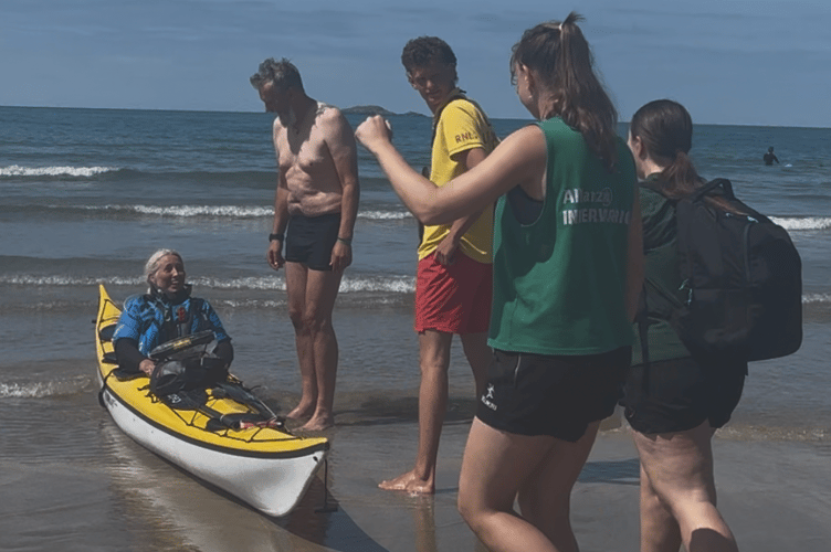 Sacha Dench arrives at Whitesands Bay, Wales after here record-breaking kayak. Picture by Angelique DaKock