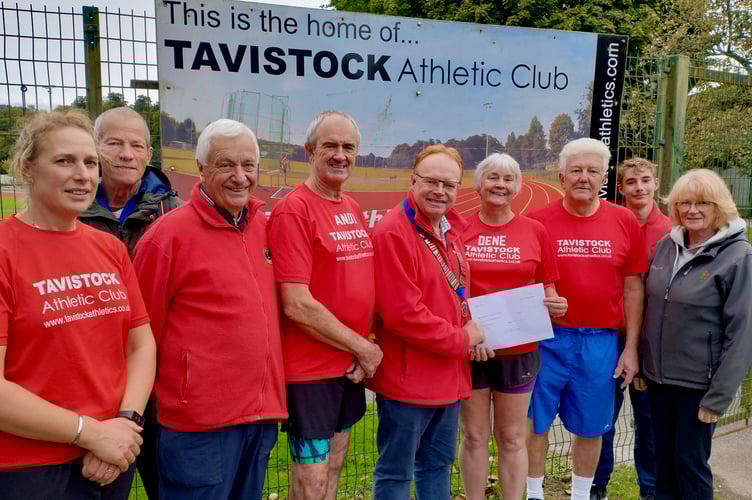 Tavistock Athletics Club present a £1,000 cheque to Tavistock Lions. The money was raised during the Lions Carnival Week - the proceeds from the running club's relay races.