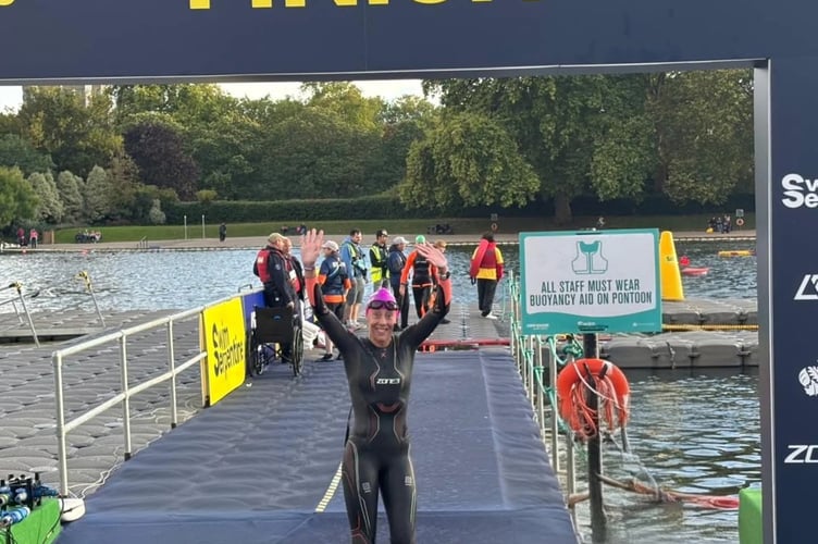 Sam Lake, Tavistock top athlete and primary school teacher, at the finish after coming a fantastic fourth out of 2,500 in the Serpentine Swim.