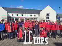 Hundreds of trekkers raise funds for rescuers and moor