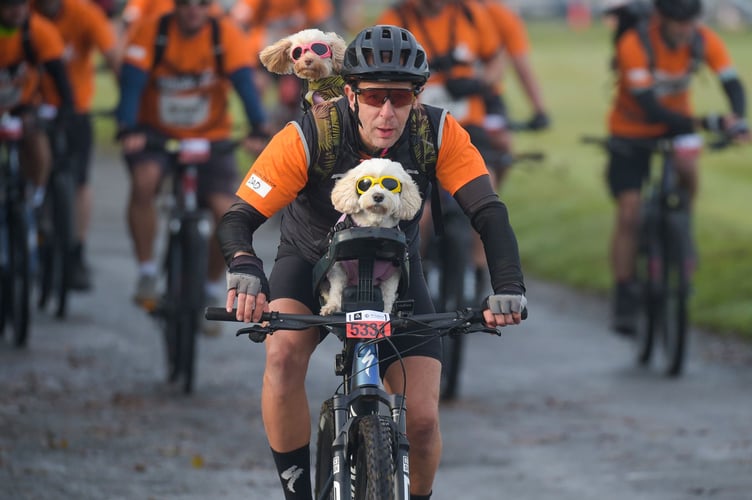 One man and his two dogs determined to finish the Tour de Moor sponsored cycle ride in aid of St Luke's Hospice across Dartmoor.  