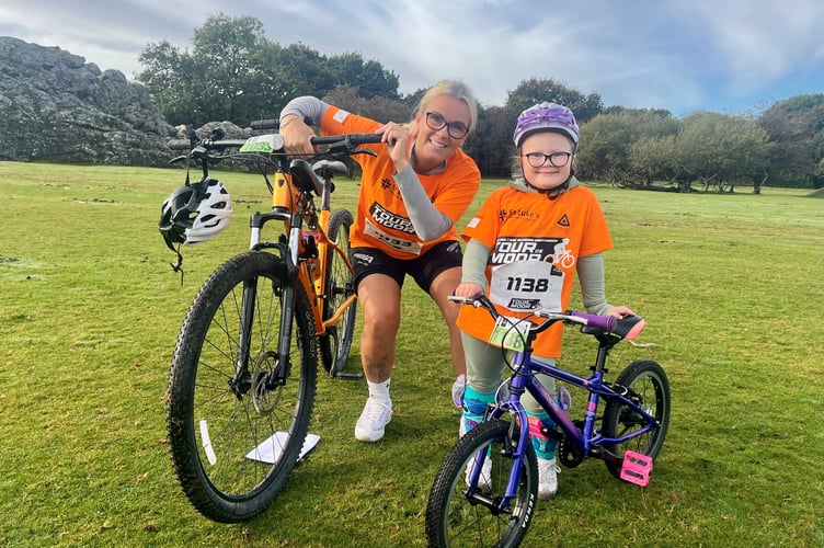 Daisy and Kayleigh Cooke on the St Luke's Hospice sponsored Tour de Moor cycle ride.