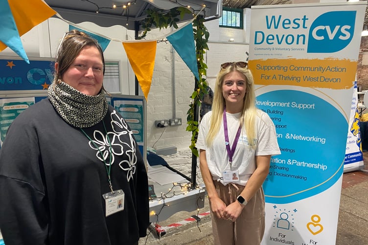 Scarlett Moon (left) and Ashly Phillips, of West Devon Community & Voluntary Services (WDCVS), raising awareness of the benefits of volunteering and the advice on offer at Tavistock Community Wellbeing Fair.