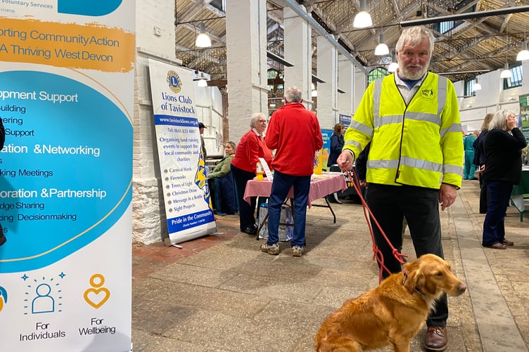 Tavistock Mayor Cllr Steve Hipsey and dog Olive at Tavistock Wellbeing Fair, promoting the litter picking volunteer group Tidy Tavi.