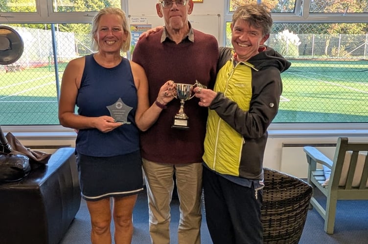 Claire Duffin, left, and Simon Church,, right, with club president  Michael Prout.
