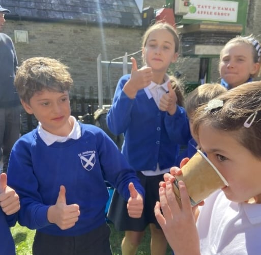 Thumbs up for the apple Juice for Buckland Monachorum School.