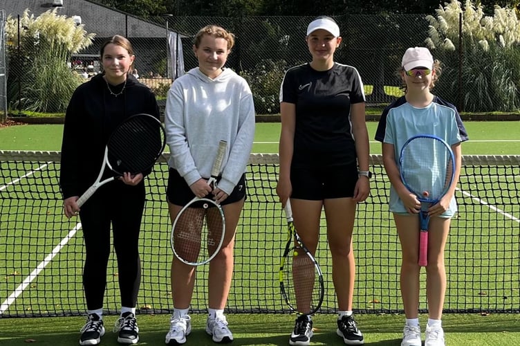 The girls' singles winners and runners up.