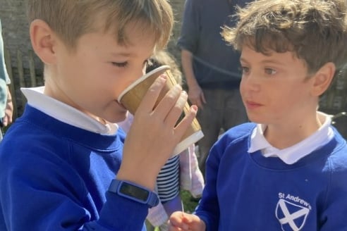 Tasting the newly pressed apple Juice for Buckland Monachorum School.