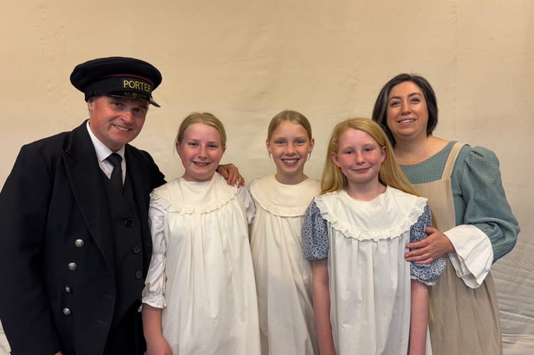 Nigel Davies as Perks and Sarah Ruby as Mrs Perks are pictured with their children from ‘The Railway Children’. AQ 4200