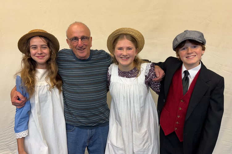 Pictured with The Railway Children, Peter (Albany Powell), Phyllis (Sahra Dack) and Roberta (Bobbie) played by Daisie Nelson is co-producer and co-director Twiggy Lake. AQ 4216