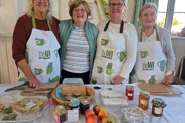 Bere Ferrers I selling their appley preserves and cakes at Bere Applefest. Picture by Ann Parsons.