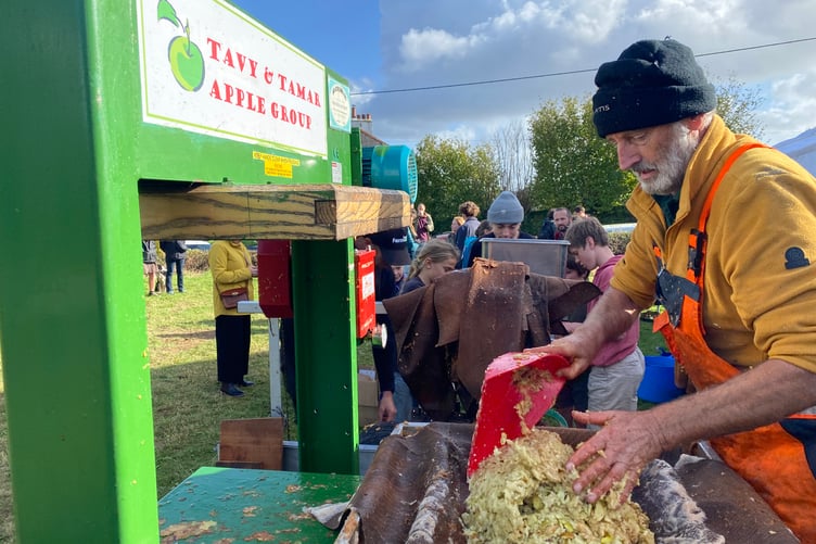 Manning the busy apple crusher at Bere Applefest.