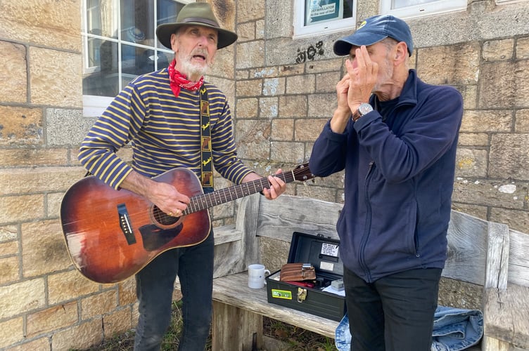 Folk singing to celebrate the rich apple harvest at Bere Applefest in Bere Ferrers. 