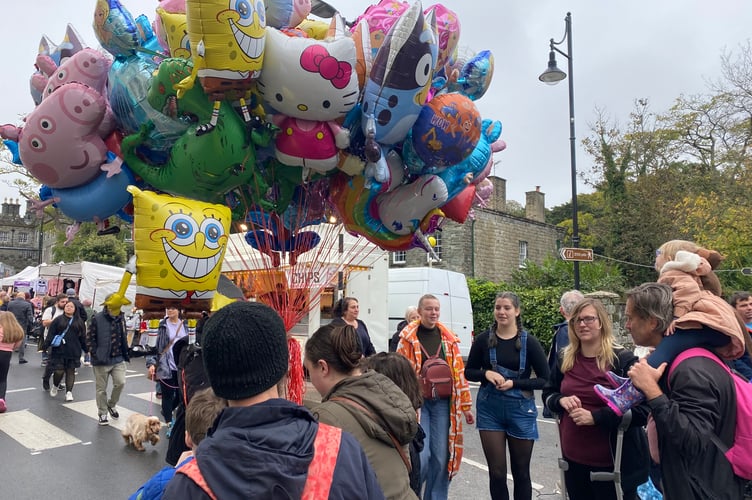 Cartoon balloons attract the young at Tavistock Goose Fair.