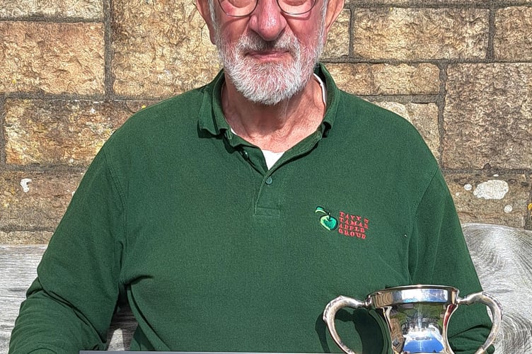 Award-winning Graham Reed has been presented with a literary award for his learned articles for his profession's journal.