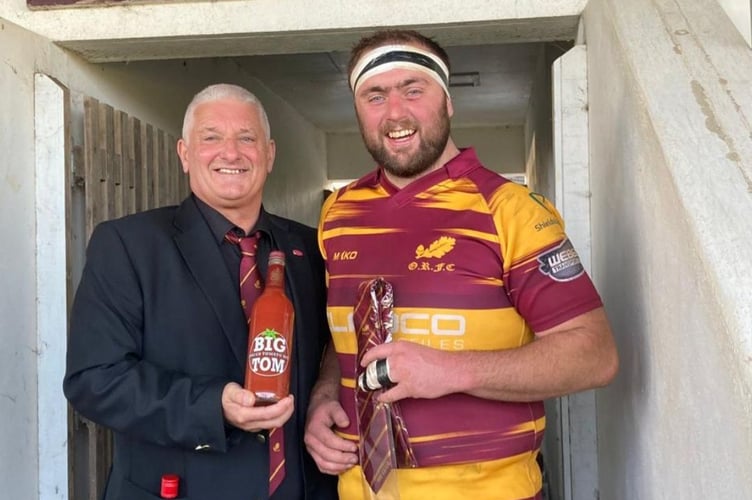 Tom White receiving his Oke RFC 100th cap tie