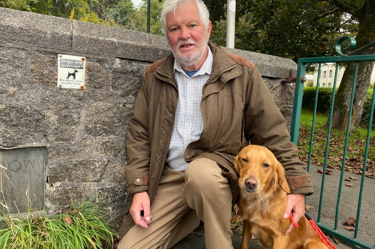 Tavistock Mayor Cllr Steve Hipsey, pictured with his dog Olive at the entrance to the Meadows park, is highlighting the need to keep dog mess off the town's streets, paths and parks.