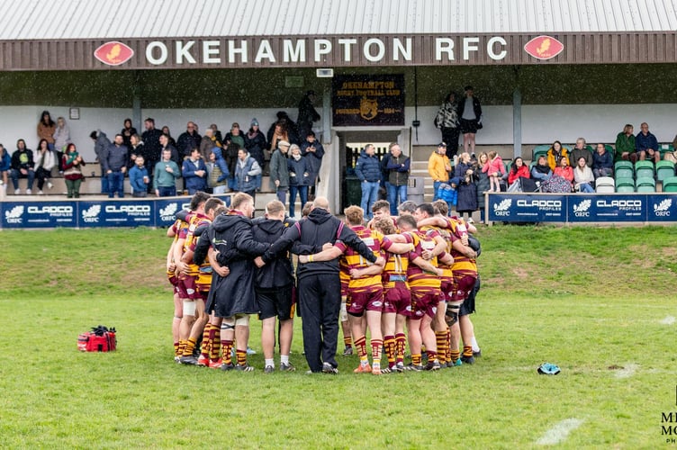 Okehampton RFC huddle after victory at home