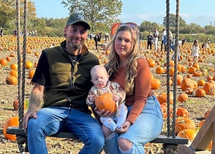 Baby Otto with parents, Sophie Reddaway, 25, and dad Paul Acreman, 27.  Otto was diagnosed with a rare form of cancer after doctors initially thought his breathing problems were a cold.