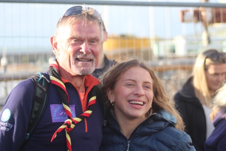 Steve James with University of Exeter Sport and Health researcher Dr Freyja Haigh, at the finish line.