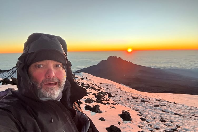Lee Spencer, inspirational one-legged adventurer and former Royal Marine reaches the top of Kilimanjaro, despite a debilitating lung infection.
