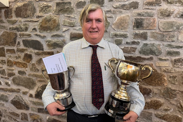 Peter Stone is Overall Champion Ploughman in Devon for a second year and also won the Vintage Trailed Class trophy.  AQ 7147
