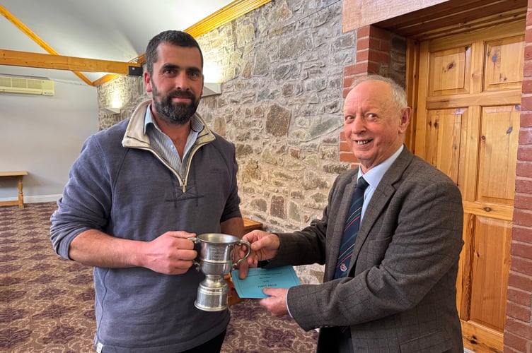 Sam Reed won the Devon County Ploughing Association Reversible trophy, presented by President Raymond Govier.  AQ 7134
