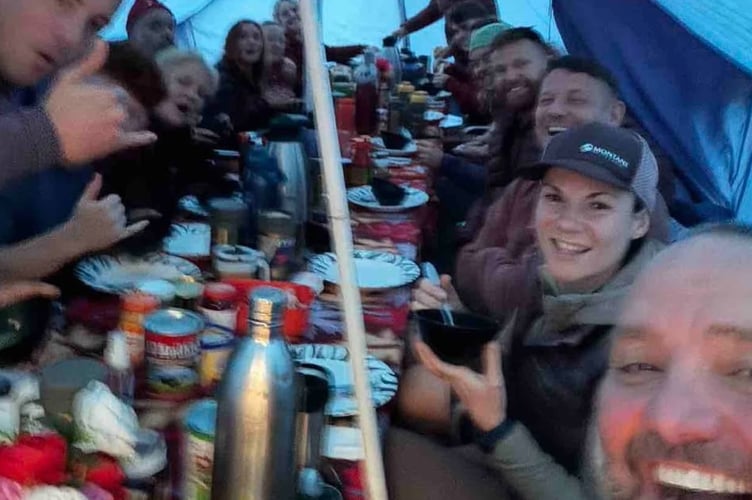 Lee Spencer with his daughter Harriet, pictured right, at base camp on their way up Kilimanjaro