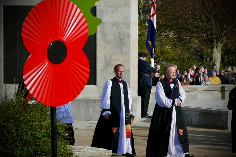 Bishop James and Bishop Mike processing in at a Remembrance Service last year.
