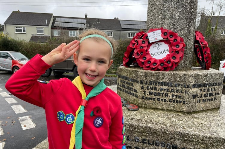 Walkham Scout Group girl at the village memorial remembrance parade.