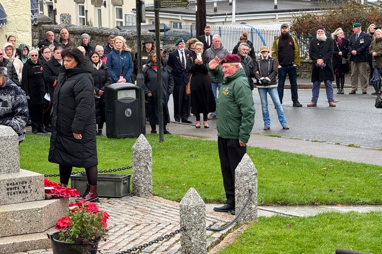 Veteran servicemen salutes the fallen at Princetown War Memorial. Picture by Jim McNeill.