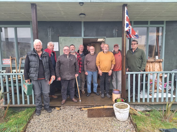 The Okehampton Men in Sheds outside their current HQ at the Okehampton Community Garden on Fatherford Lane.