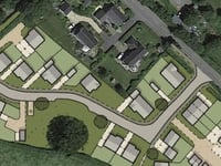Disputed village housing plan resurrected
