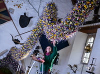 Cotehele's record-breaking garland with 38,000 flowers