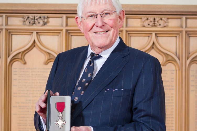 Peter Burroughs collecting his MBE at Windsor Castle.
