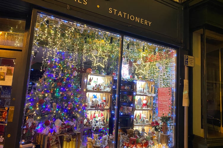Dolans glittering shop front bringing festive fun to Tavistock high street.