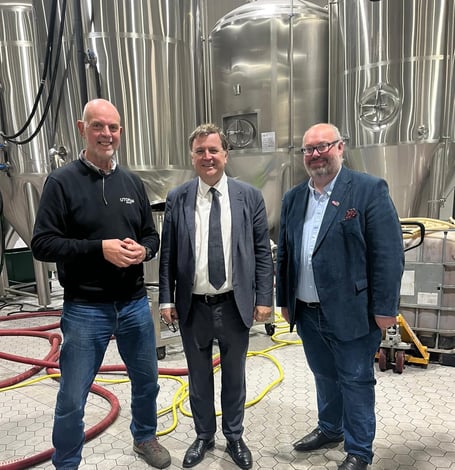 Central Devon MP Mel Stride, centre, on a visit to Utopian Brewing in Bow.
