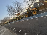 Farmers' tractor rally tax protest