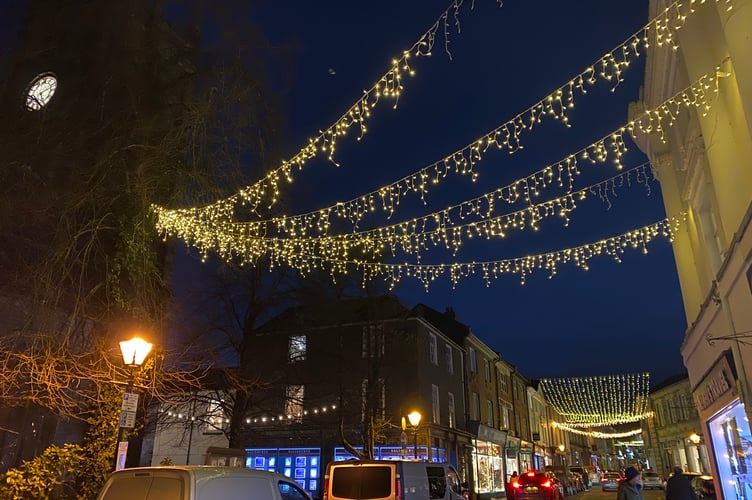 West Street glittering in festive lights in Tavistock.