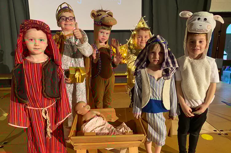 Horrabridge Primary and Nursery's nativity play with a star of Bethlehem, a king, donkey, sheep, Mary and Joseph and of course a baby Jesus.