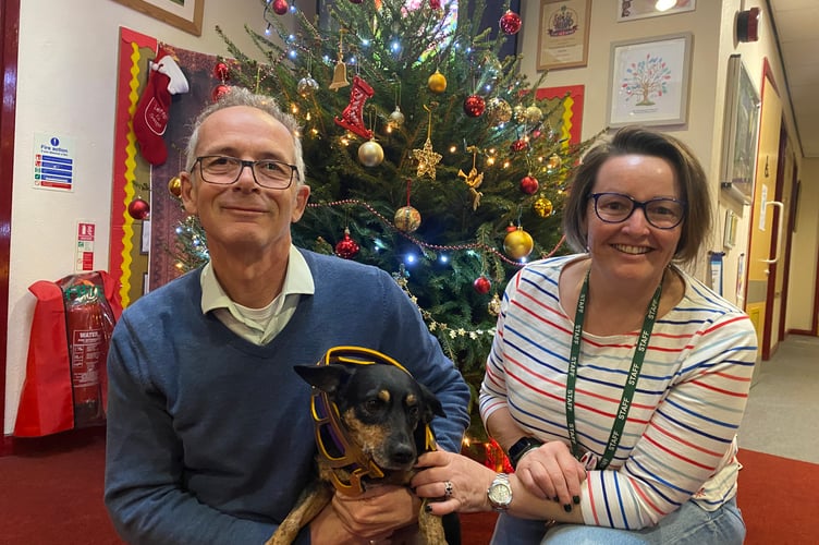 Horrabridge Primary School staff and school dog taking a break from Nativity Play rehearsals. Headteacher John Clarke and teaching assistant Ali Smith with MXX.