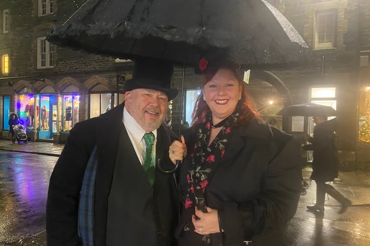 Tavistock Dickensian Evening - a couple of revellers dress up nostalgically.