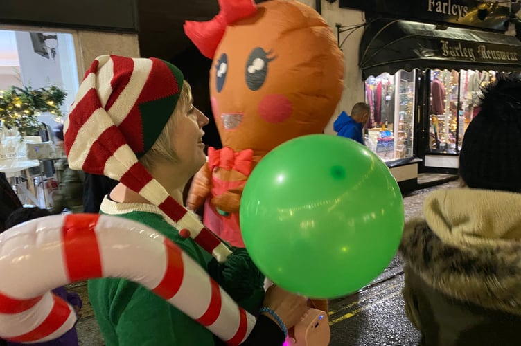 Tavistock Dickensian Evening - festive street characters entertain the youngsters.