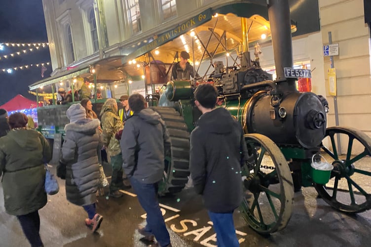 Tavistock Dickensian Evening - a fitting attraction for a period scene a Robey Trust steam engine taking merrymakers on steaming rides.