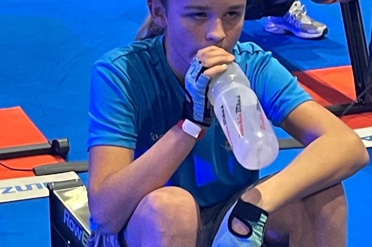 Tamar and Tavy Rowing Gig Club member exhausted after reaching the top ten in a national indoor rowing championships.