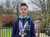 Teen runner triumphs twice