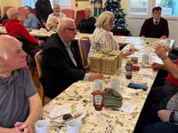 Military veterans enjoy festive breakfast