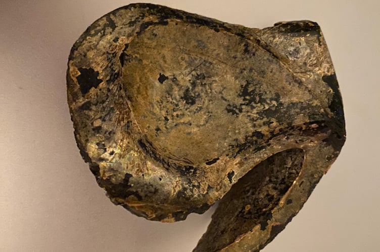 Eileen Bargery with her mystery object she believes is an Tavistock Abbey artefact.