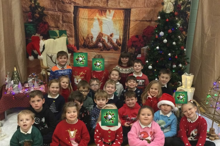 Edgcumbe Class at Bere Alston Primary in their Christmas jumpers.