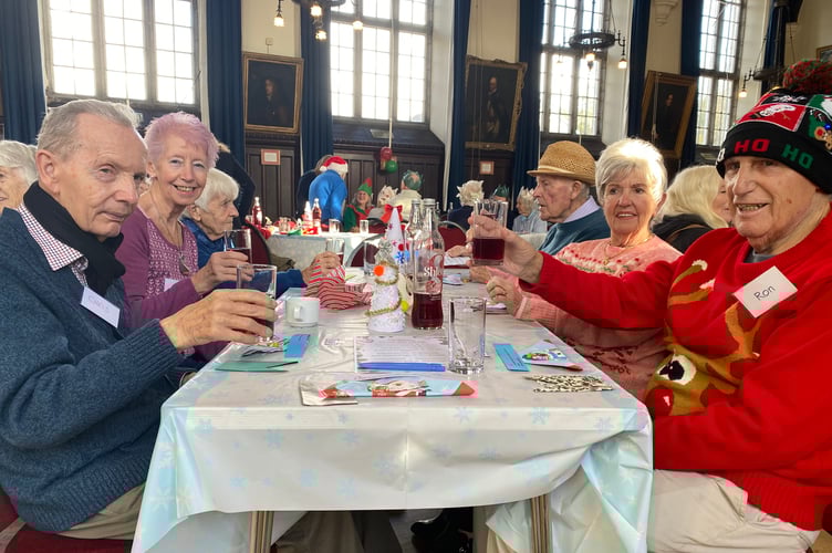 Tavistock Memory Cafe volunteers, carers and family took over the town hall for their Christmas lunch on Friday, December 12. They were entertained by Tavistock Primary School's Big Choir.